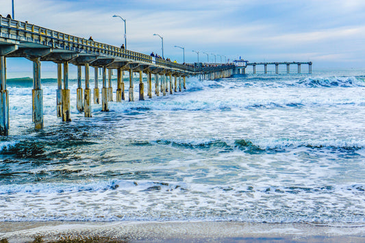 Ocean Beach Pier, San Diego, with surf rolling beneath the dock