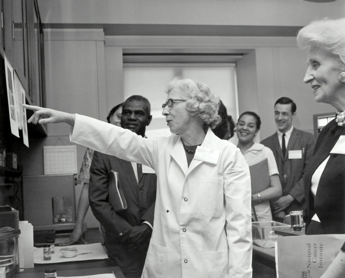 Archival 1962 photograph of Dr. Margaret Kelly, Medicine Branch, conducting laboratory research. Photo: National Cancer Institute via Unsplash.